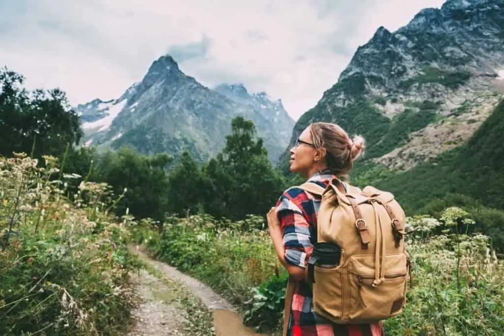 hiker walking in mountains