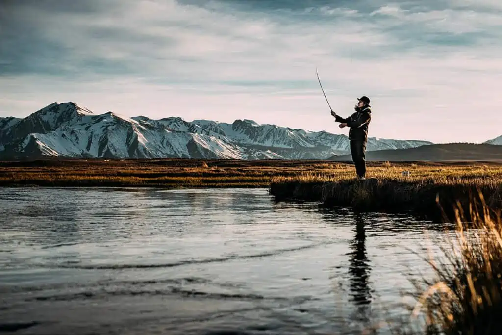 Person trout fishing in a creek