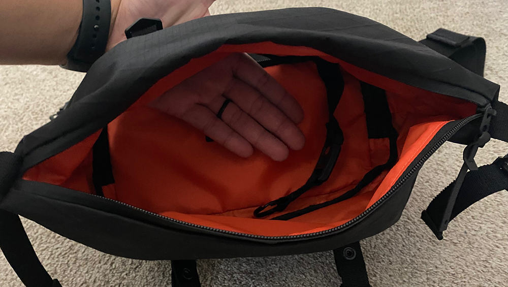 two access points in the second main compartment of the sling pack
