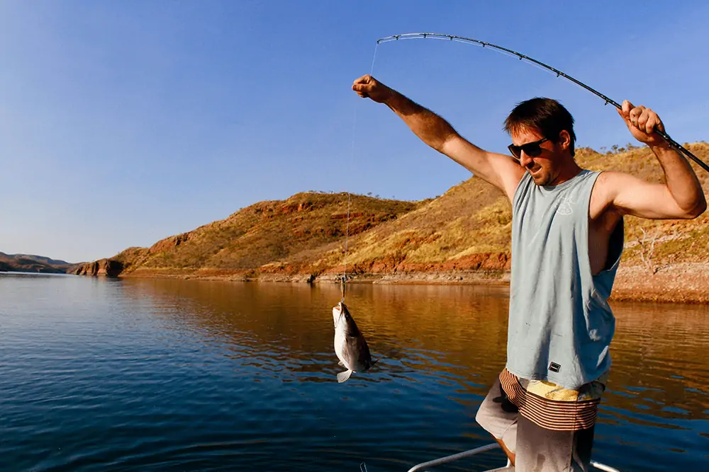 guy fishing at a lake
