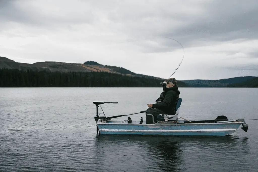 man fishing on a boat