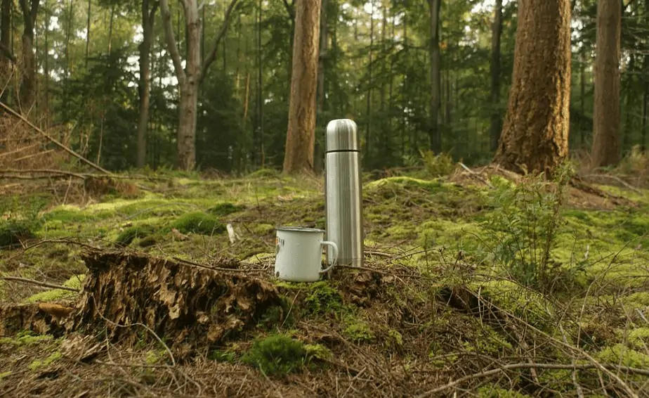 coffee flask in the woods