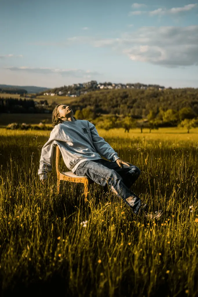 guy smoking in a field