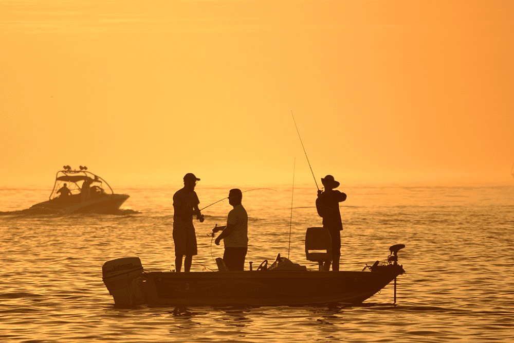 three fishermen on their boat