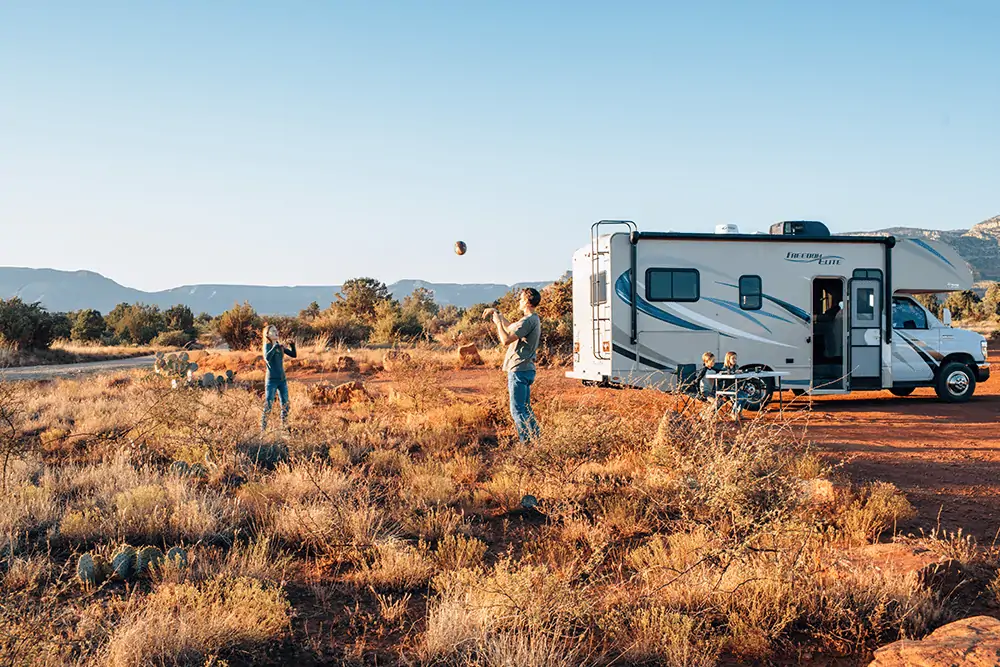 family out camping in an RV