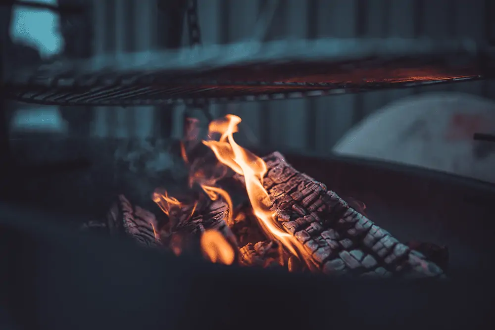 firewood under grill