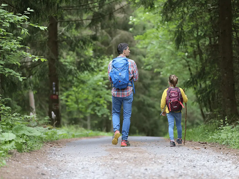 family on a walking trail