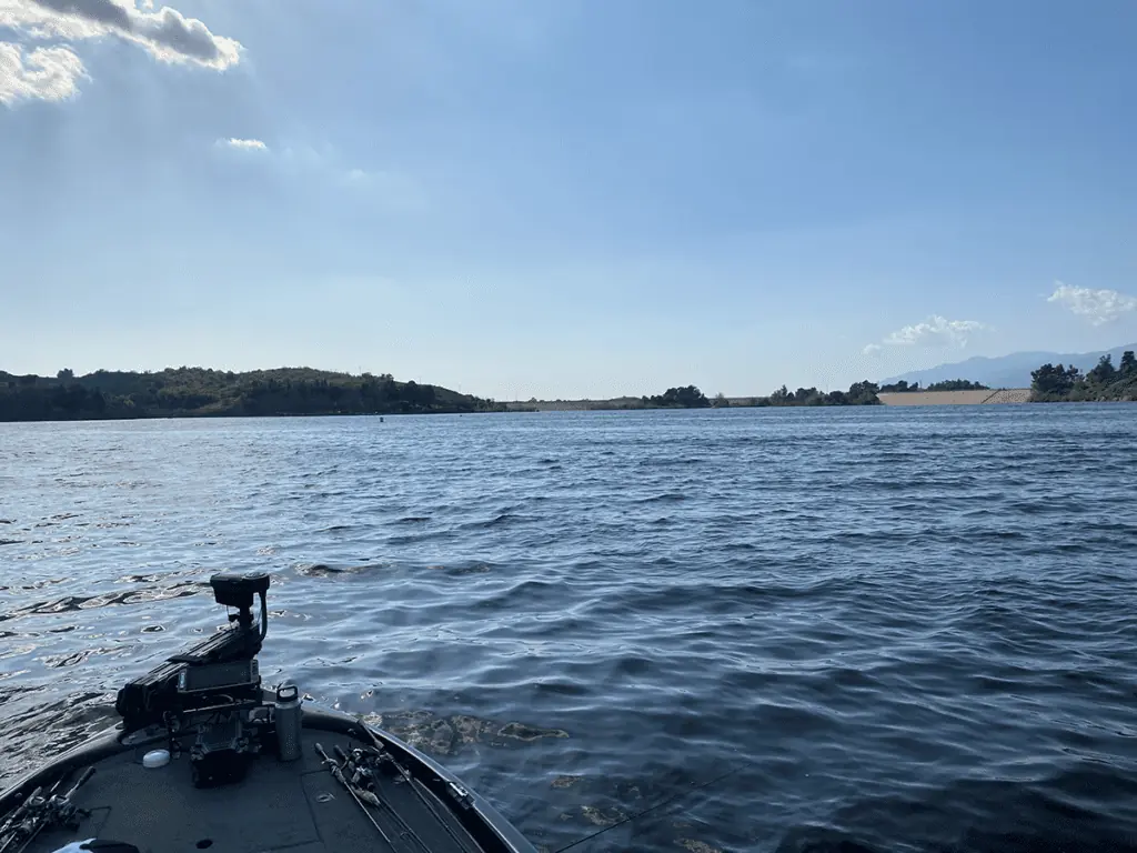 fishing boat with trolling motor on lake